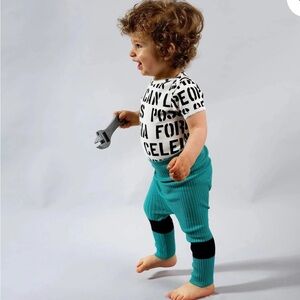 Vibrant Teal and Black Kids Leggings by boutique label, Wolf and Rita